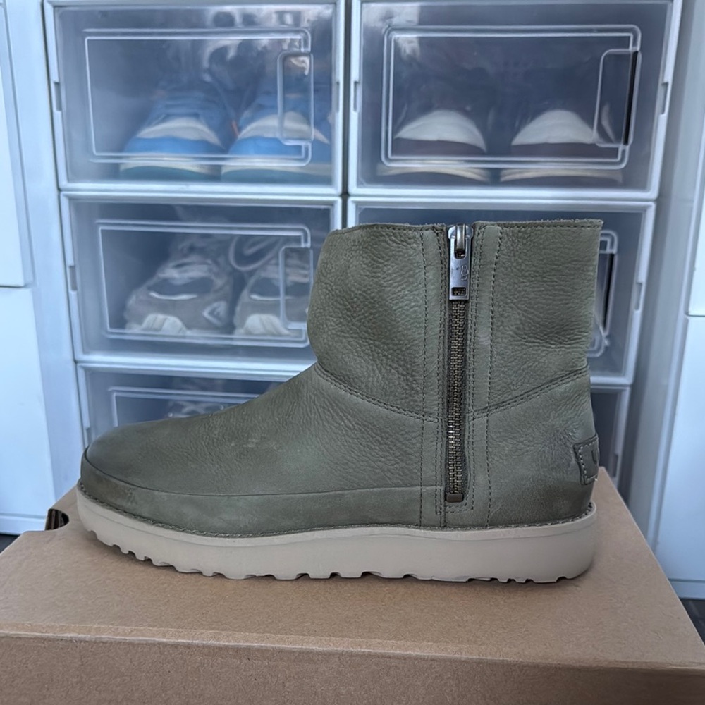 Green Ugg deconstructed mini zip up boots.